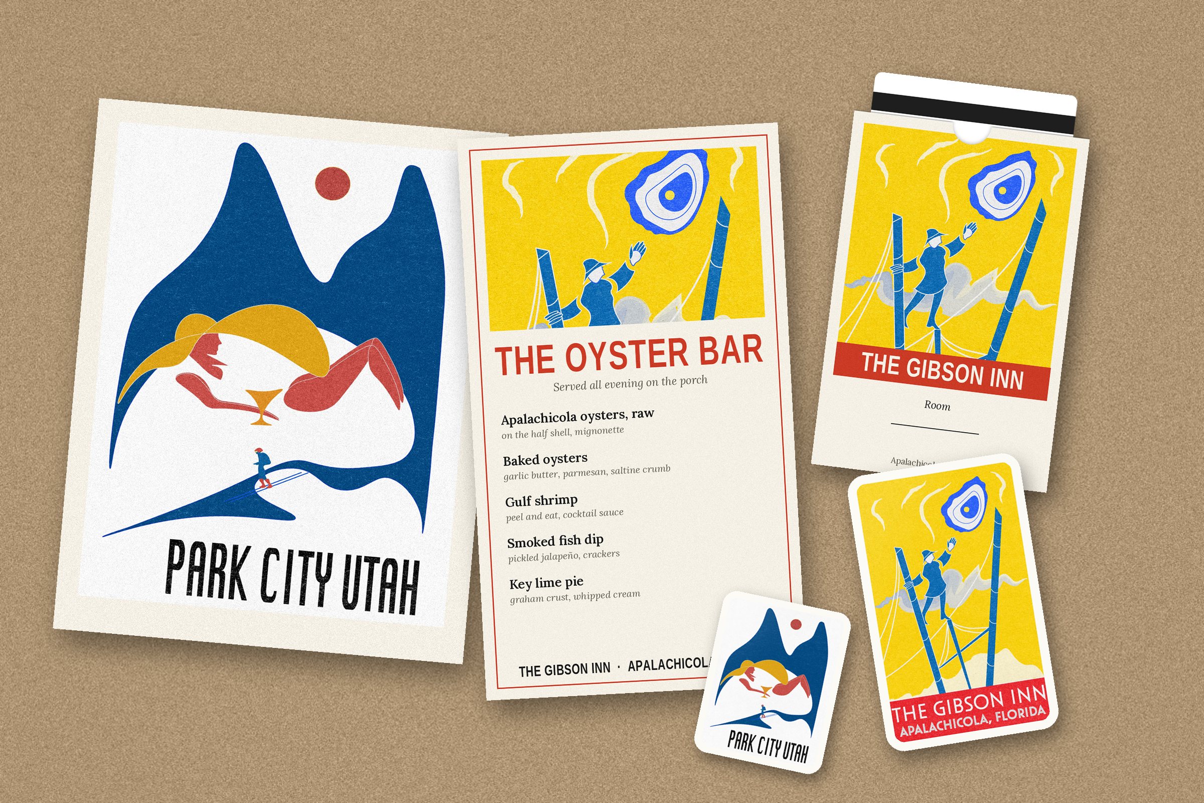 Flat lay of the kit: Park City poster, Oyster Bar menu, Gibson Inn keycard sleeve and stickers
